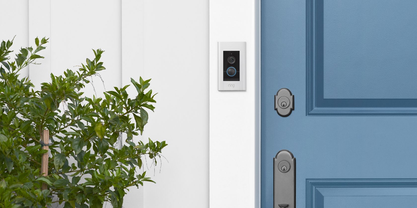 Ring Doorbell Elite on White Wall with Blue Door