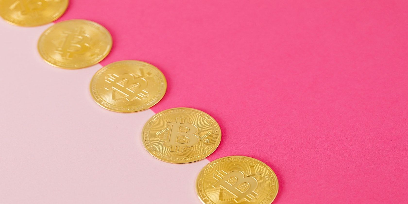 Bitcoins on Pink Surface