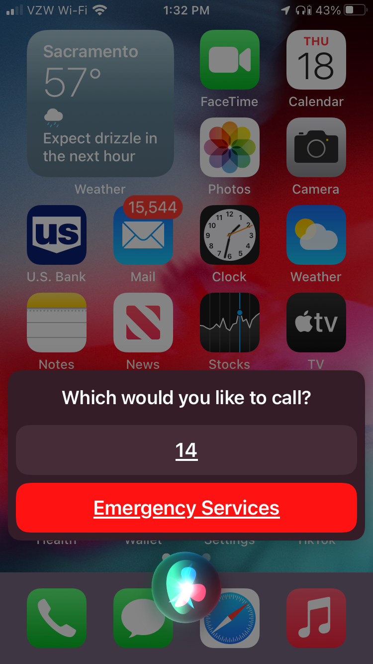 The iPhone asks whether the user would like to call emergency services or 14.