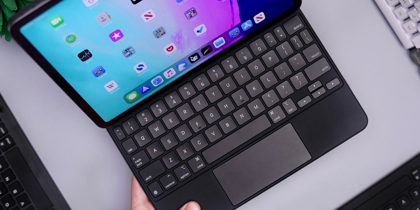 iPad in Magic Keyboard case with trackpad.