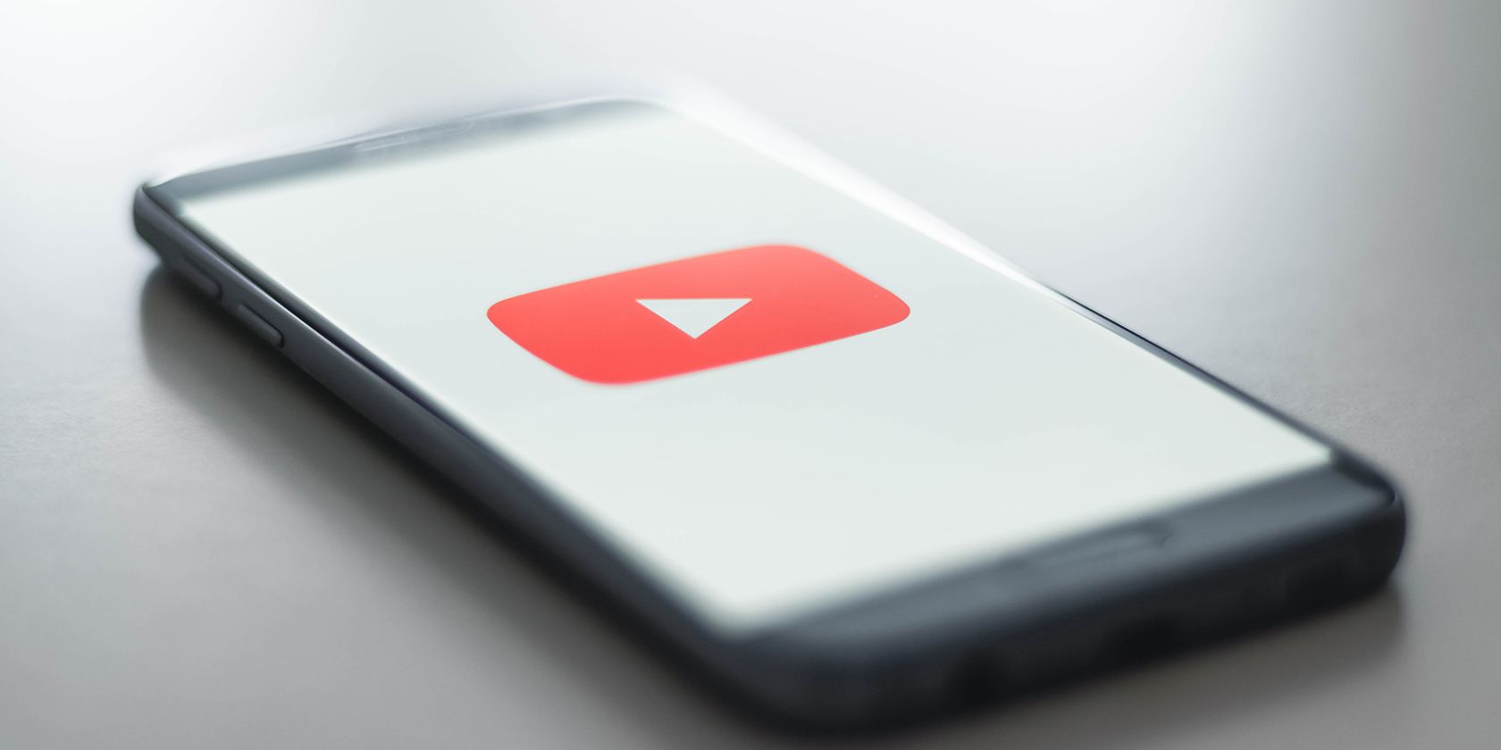 YouTube logo on a phone