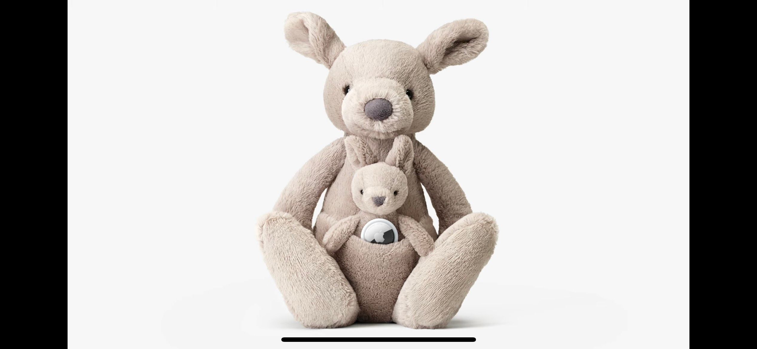 Apple Airtag Attached to Stuffed Bunny with Baby