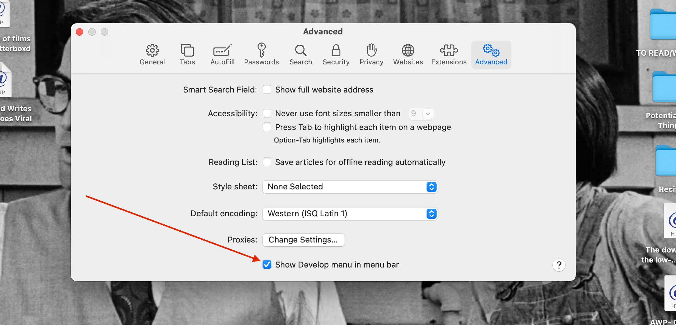 The Safari Preferences window on a MacBook Pro, with the the "Show Develop menu" checkbox highlighted