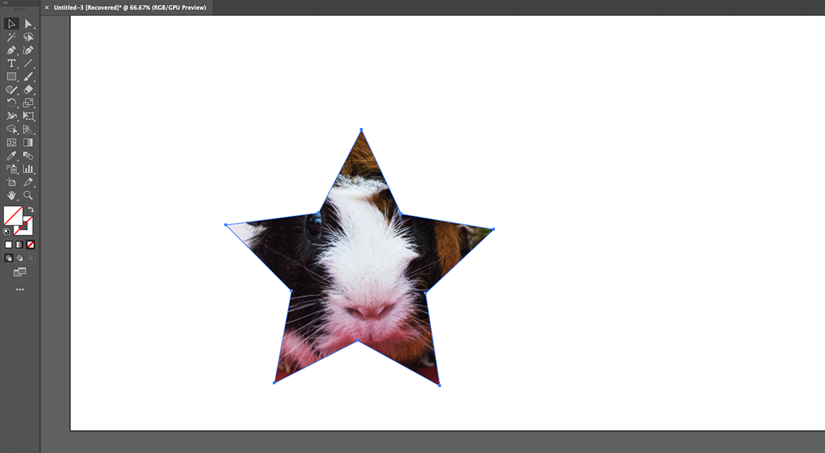 So beschneiden Sie ein Bild in Adobe Illustrator - Star shaped clipping mask applied in Illustrator