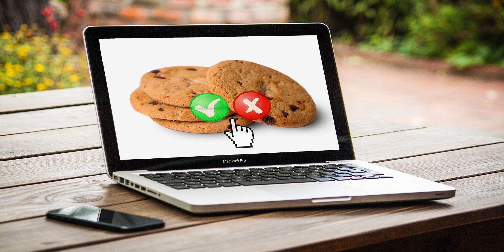 browser cookies with check and cross marks on a laptop screen