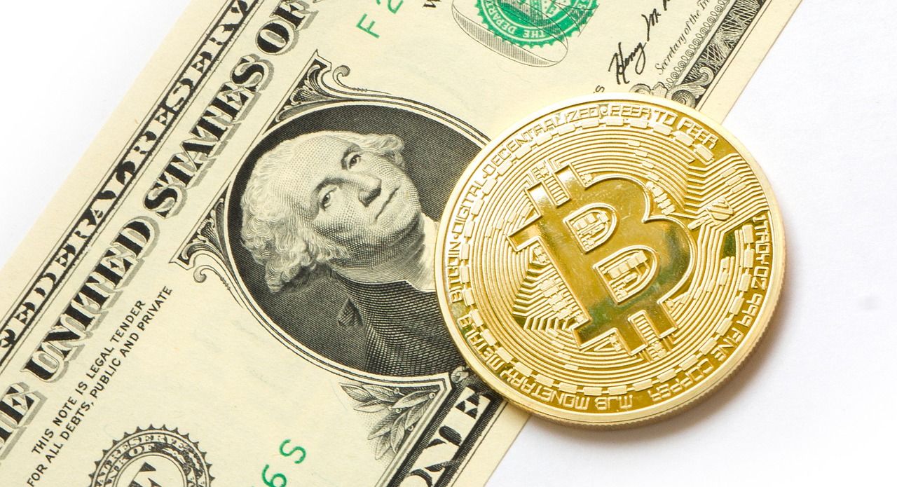 A dollar and a bitcoin.