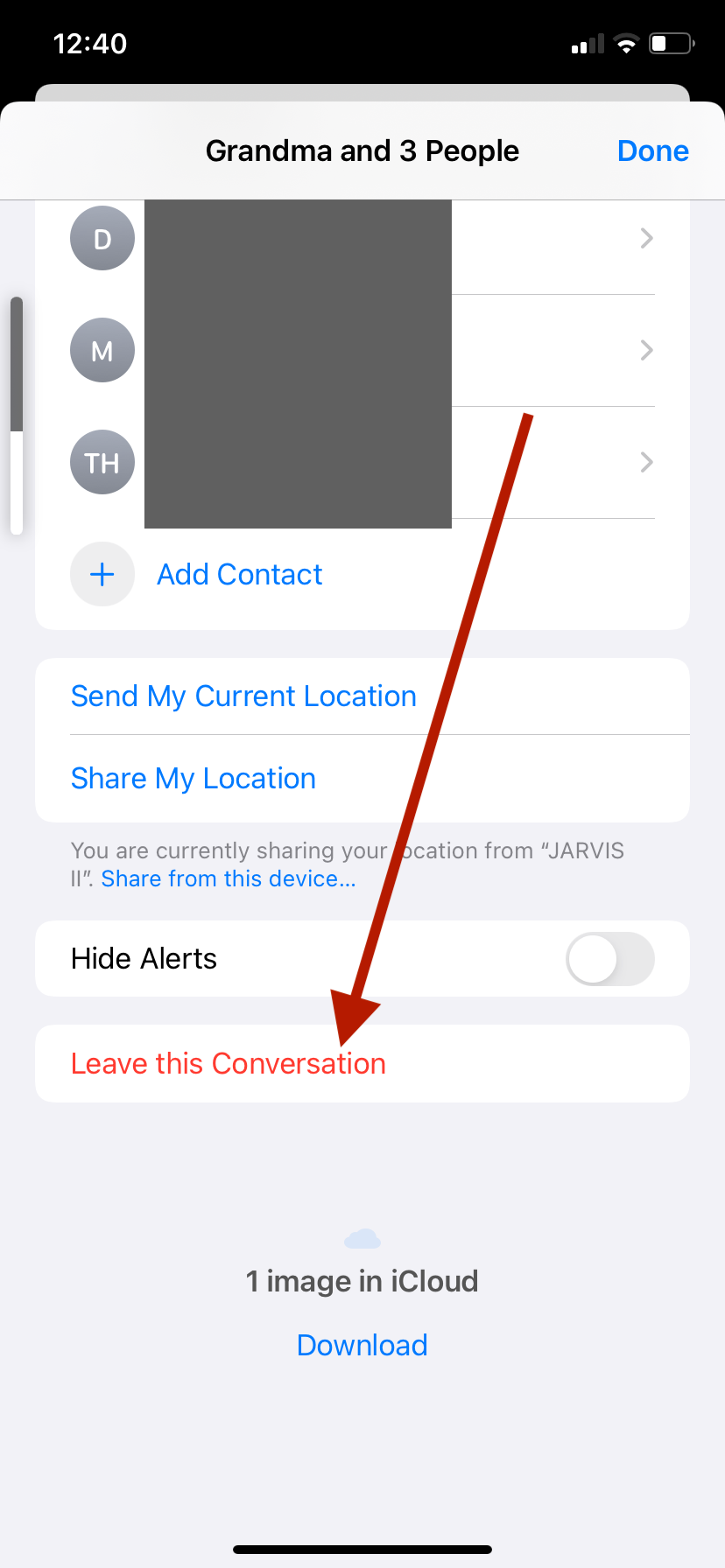 The info menu in an iMessage group chat on an iPhone. An arrow points to the Leave this Conversation button