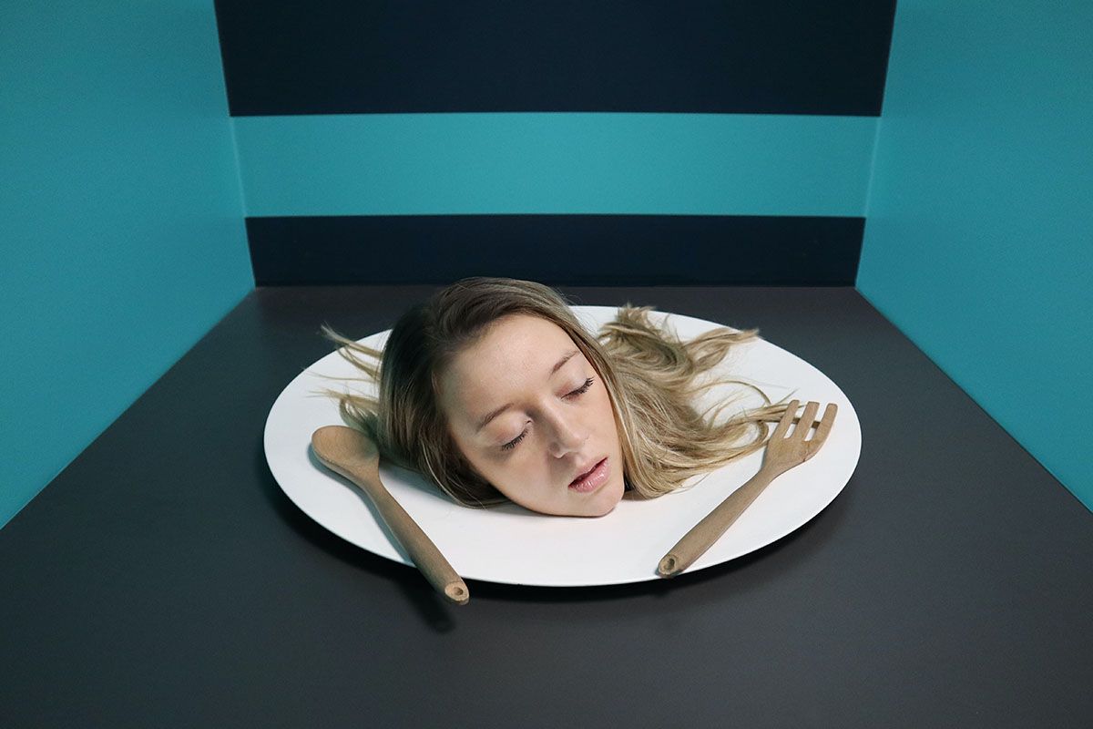 photoshopped woman's head on plate