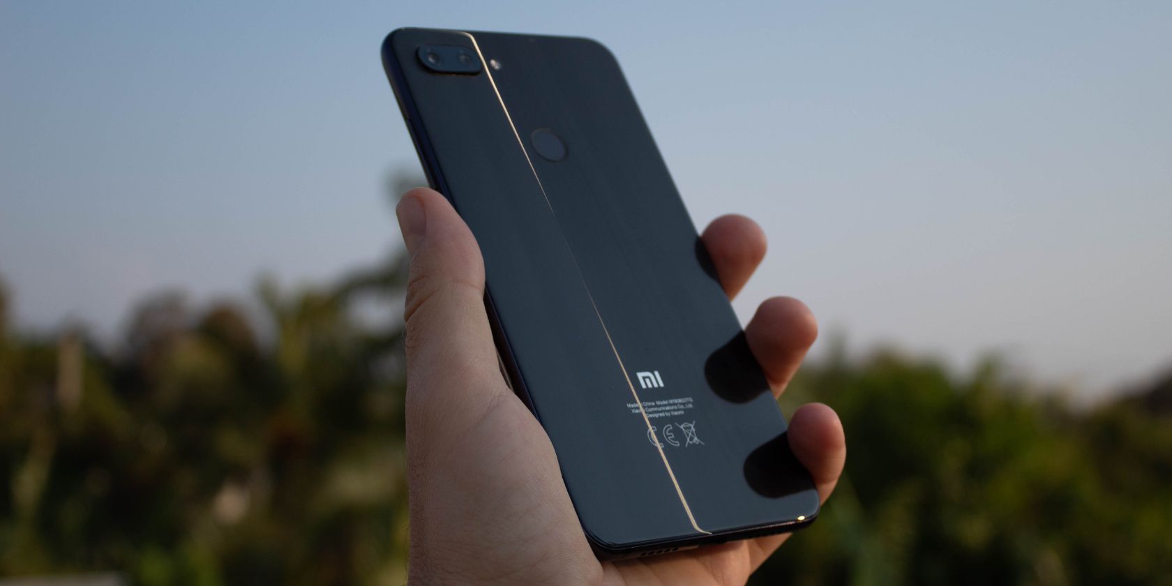 Close-up of the Xiaomi logo on one of its phones