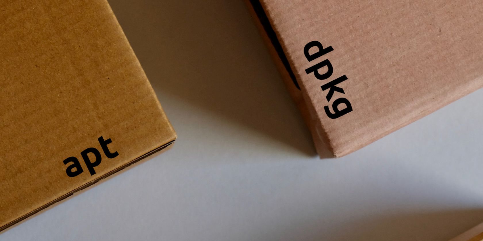 Cardboard Boxes Printed with the Words apt and dpkg