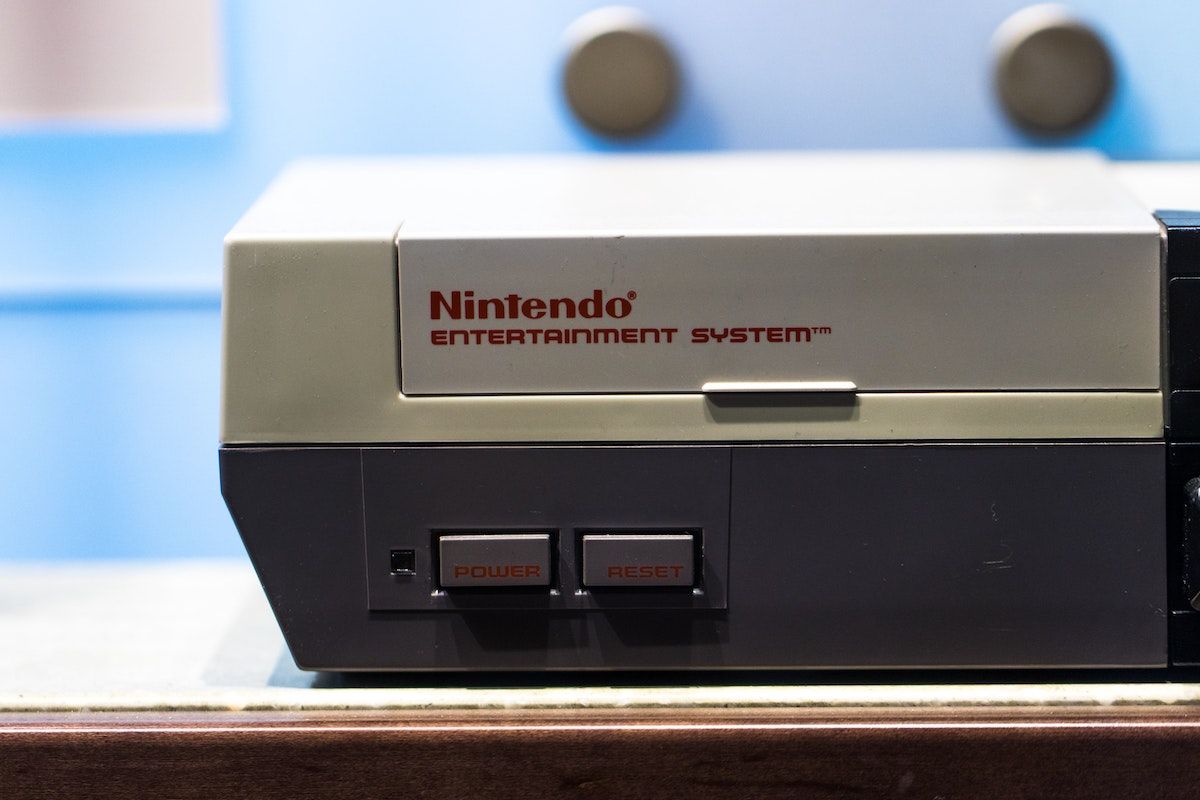 A photograph of a Nintendo Entertainment System console, close-up.