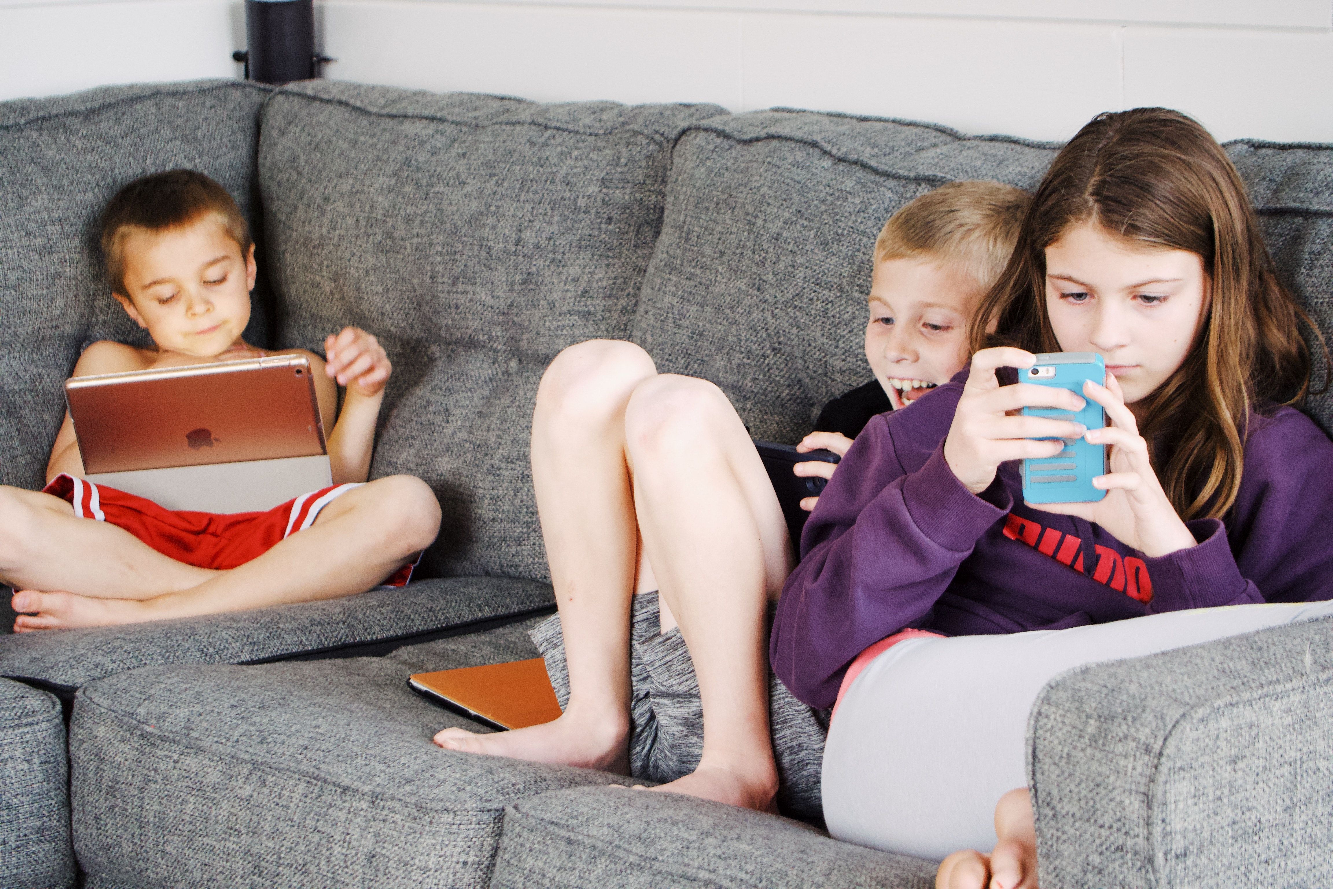 Three children using Instagram for kids app