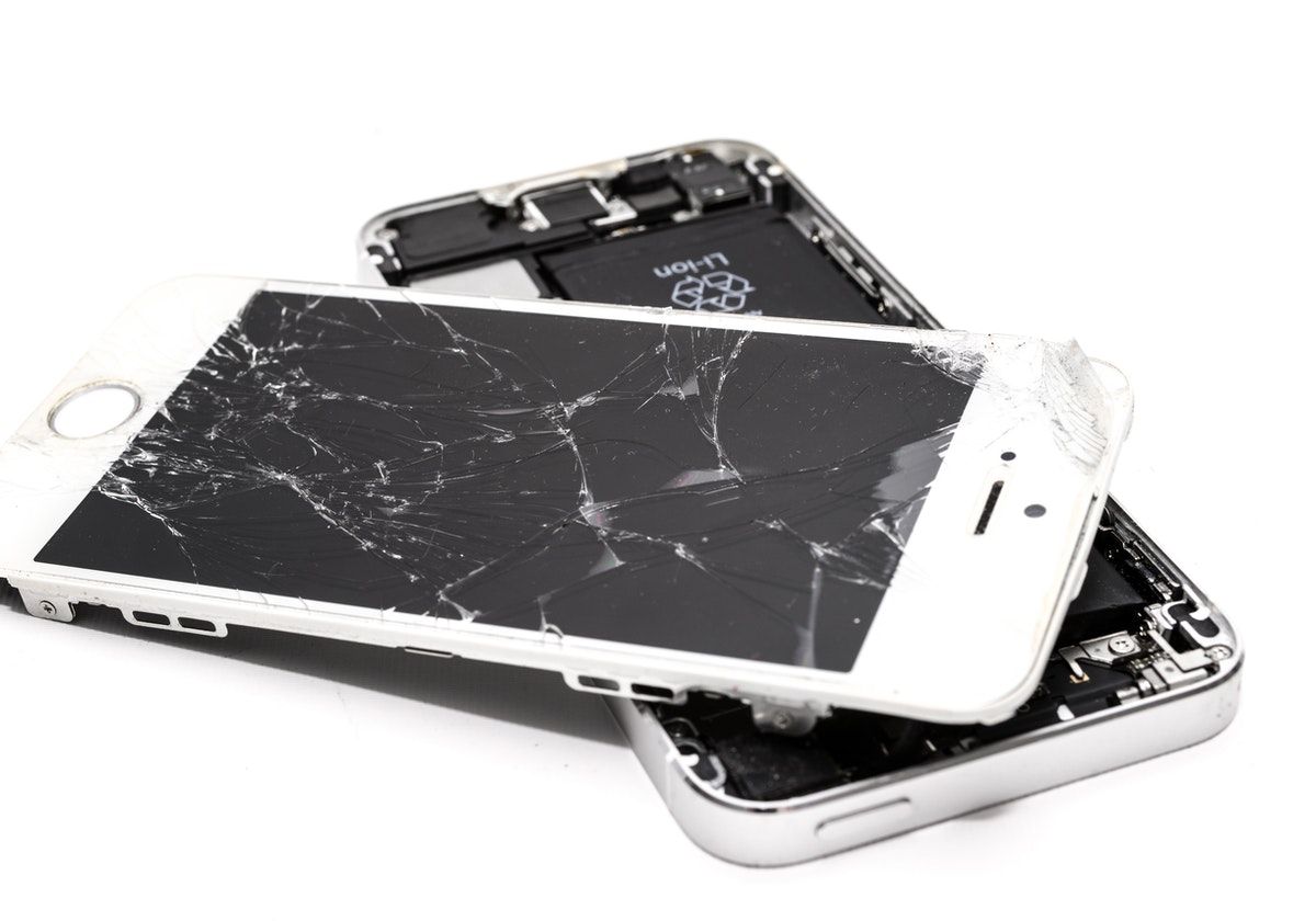 White iPhone Smashed and Screen Ripped Off