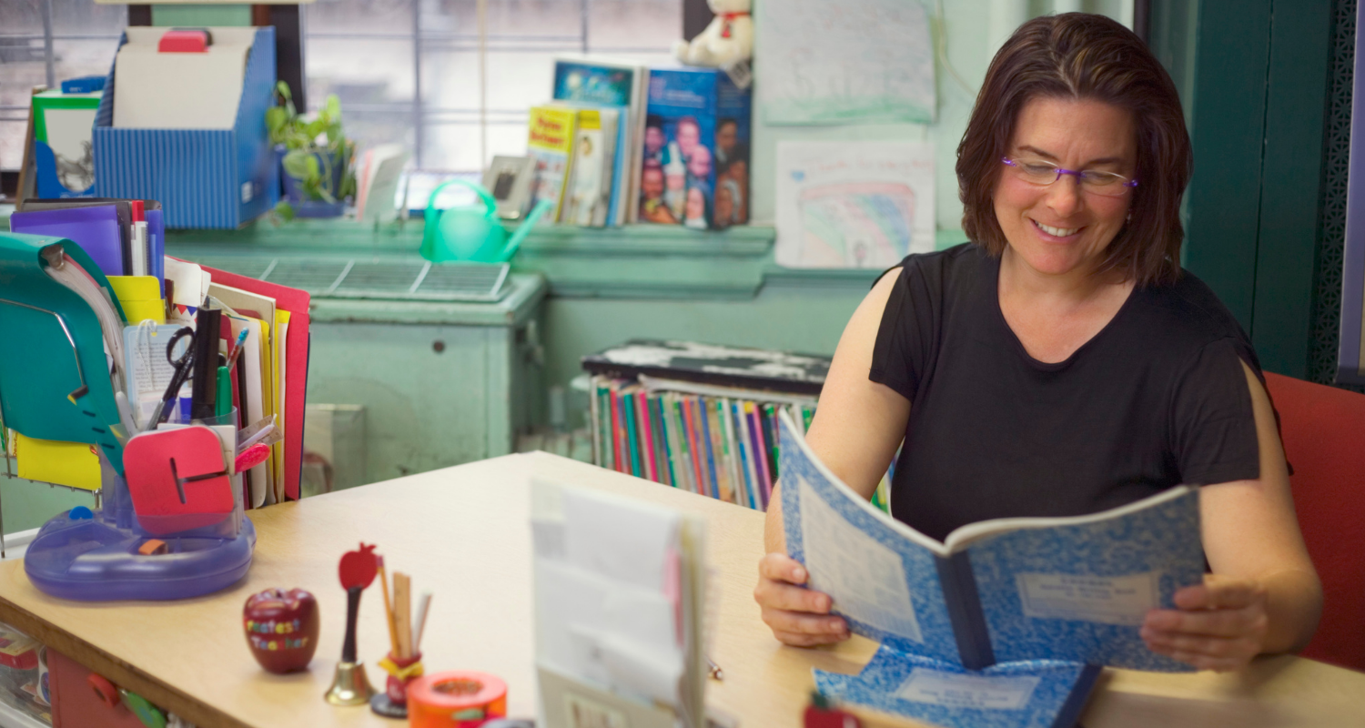 A teacher reading to her class