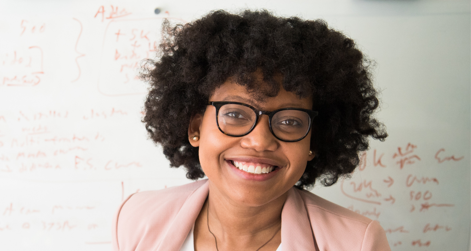 Teacher being expressive smiling in class