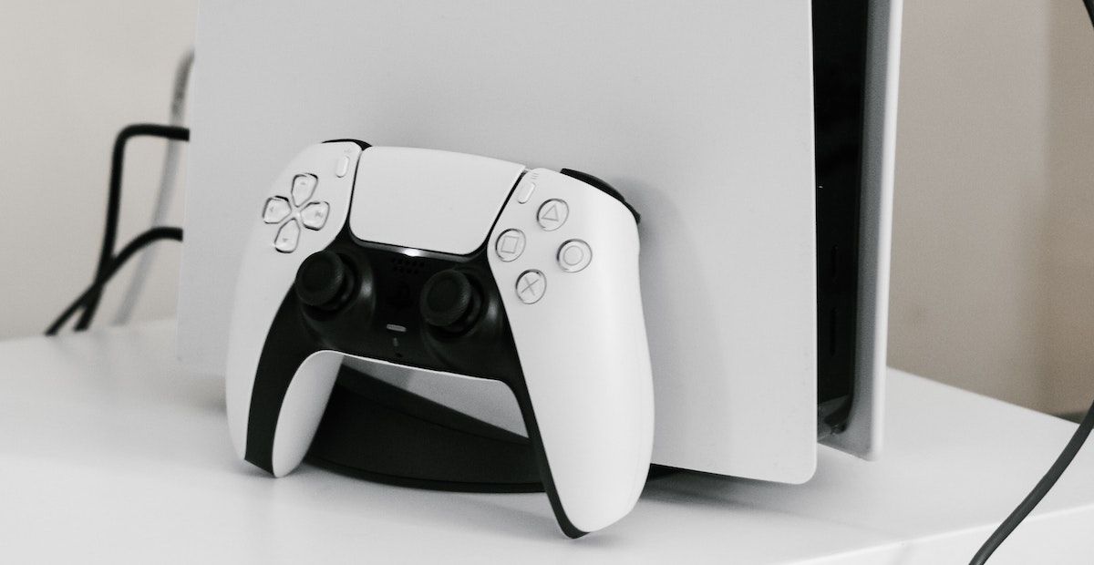 A DualSense controller resting on a PS5