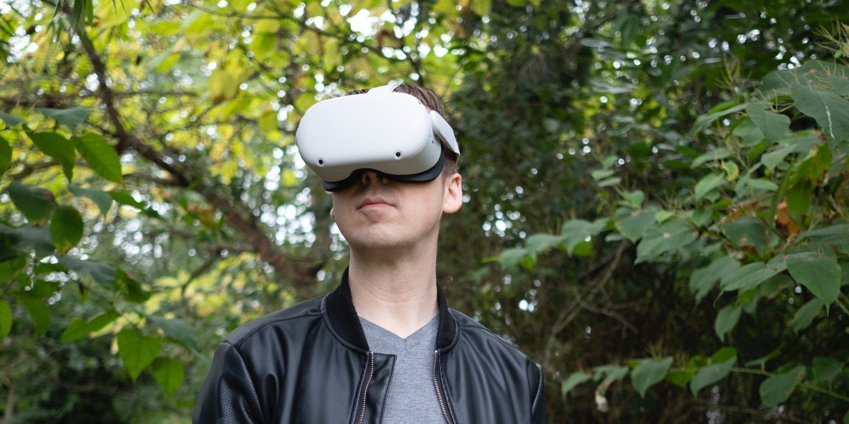 guy with oculus quest in the forest