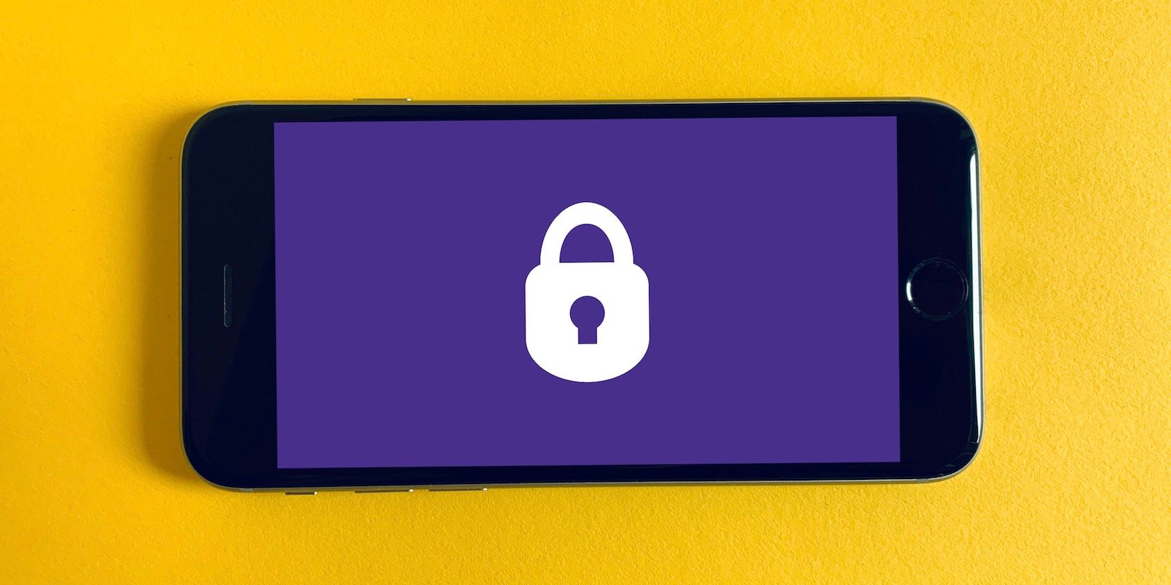 iPhone with lock icon on purple screen