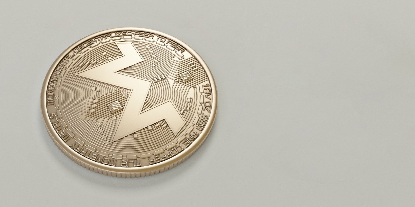 Pexels stock image of Monero privacy coin on a white surface
