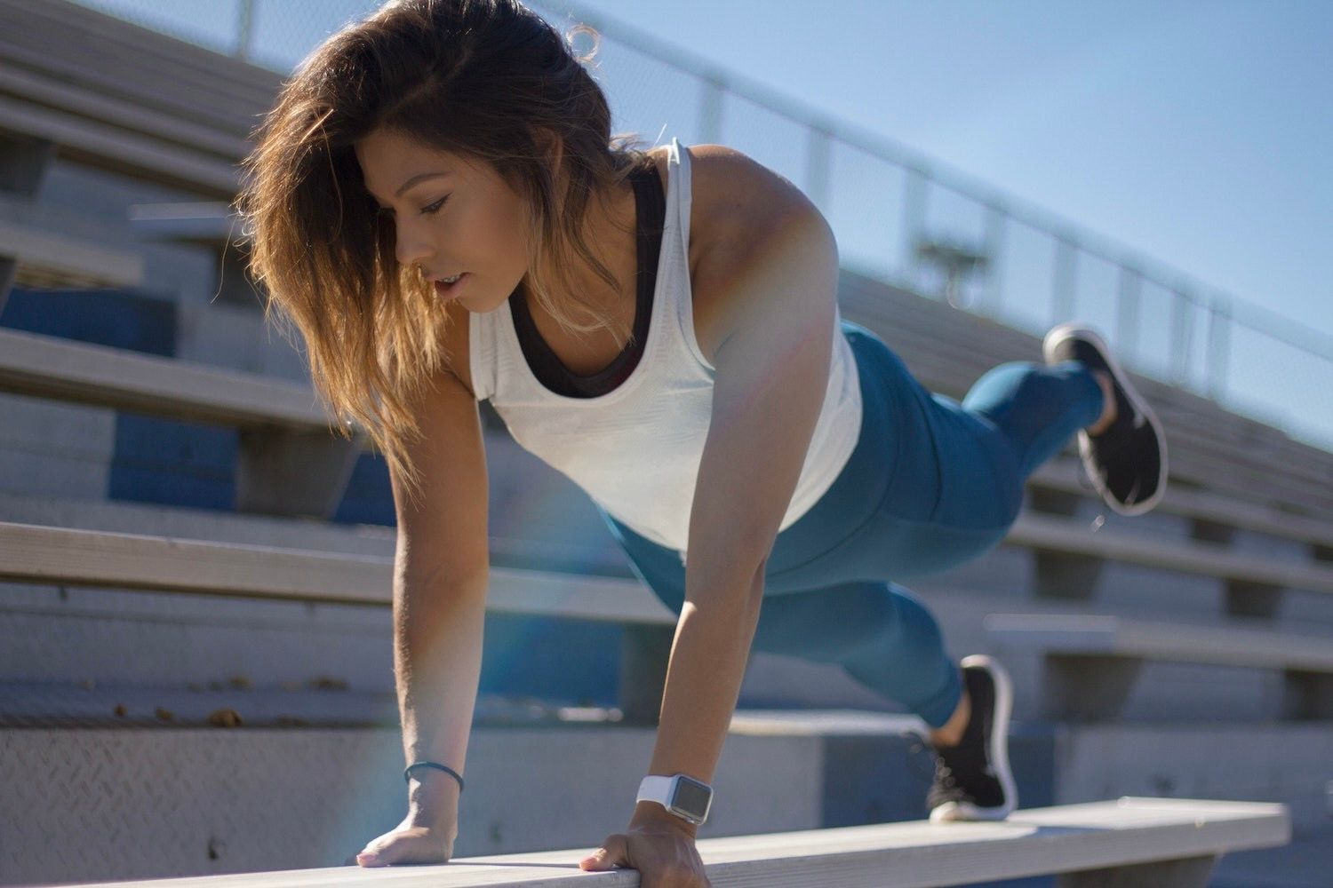 Person exercising wearing Apple Watch