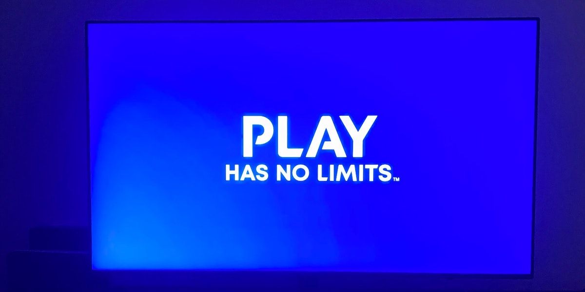 A blue screen displaying the words Play Has No Limits