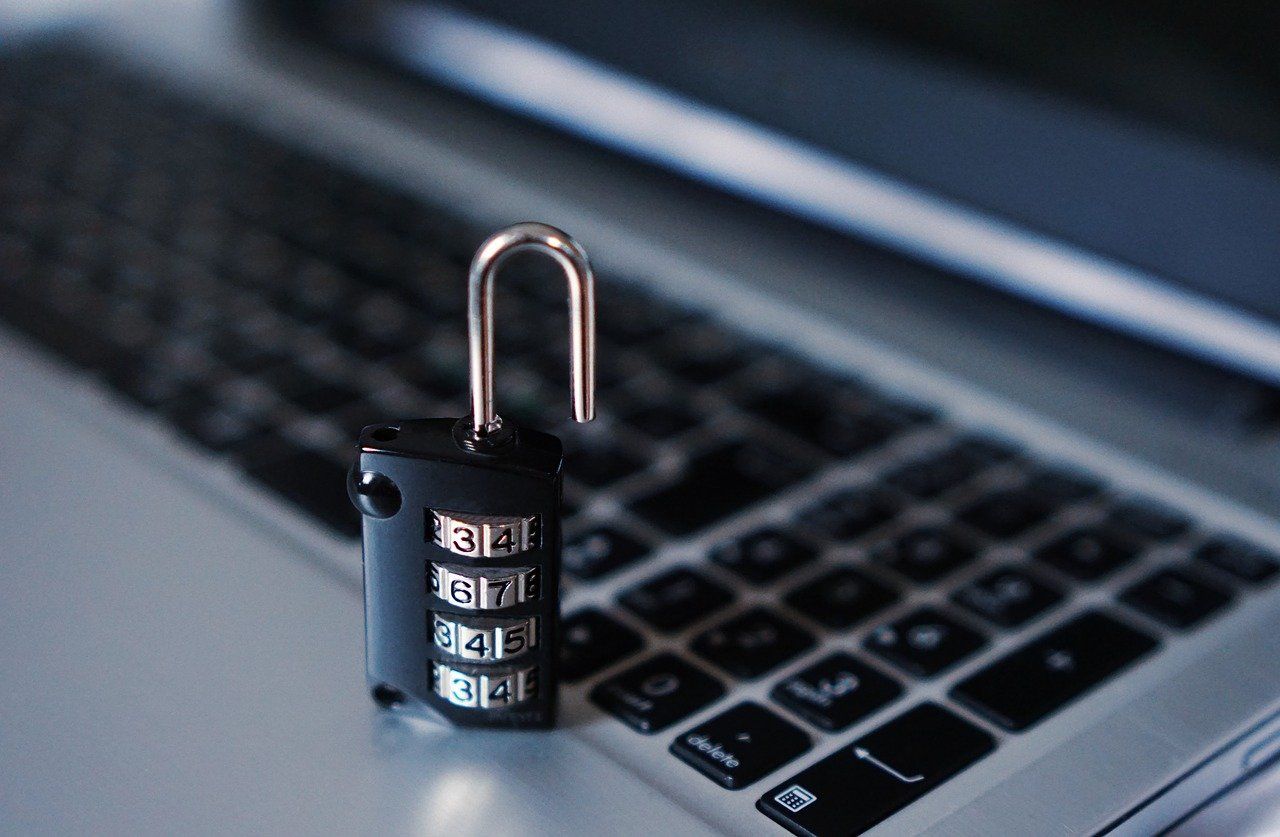 Pixabay stock image of a security lock resting on a laptop
