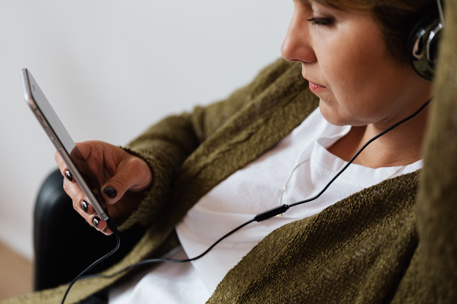 A woman listening to music