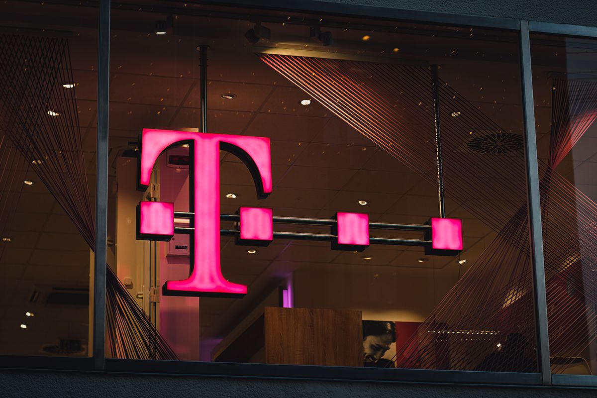 A T-Mobile Sign in a Company Store Window