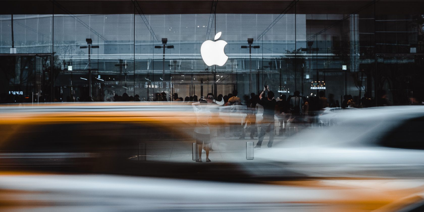 Photo of an Apple Store on a busy street