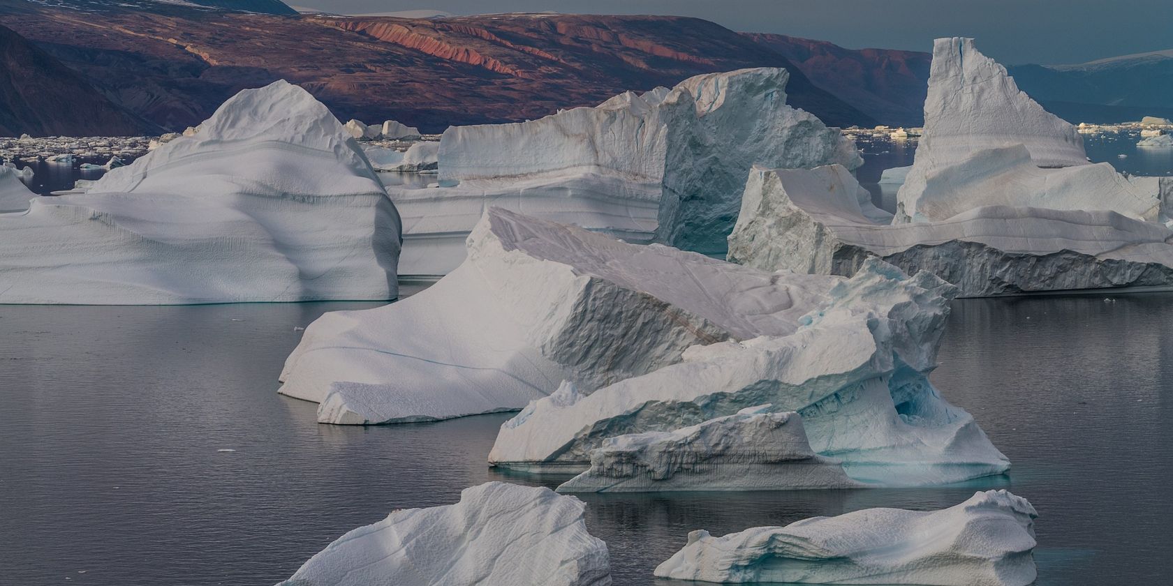 ice bergs on water in arctic