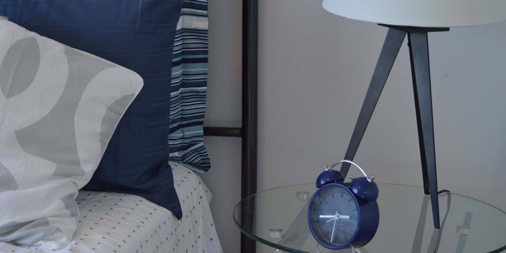 Alarm clock on a bedside table