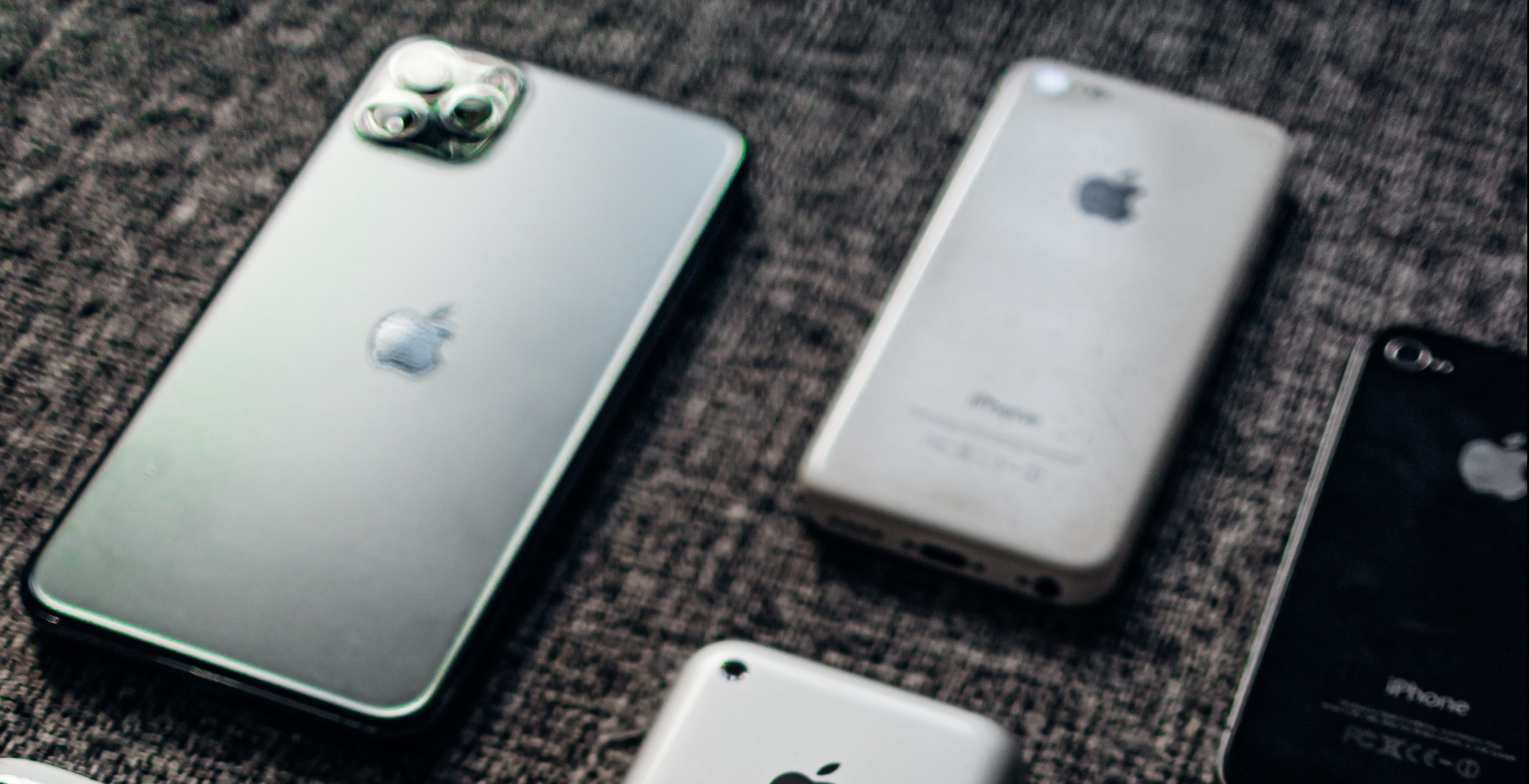 A close-up of different iPhones as the design changed.