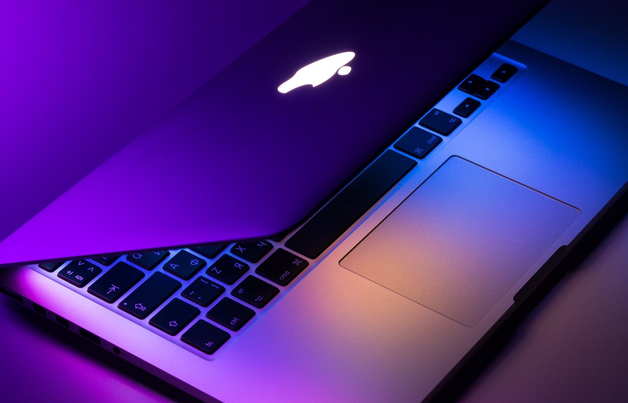 MacBook with Glowing Logo