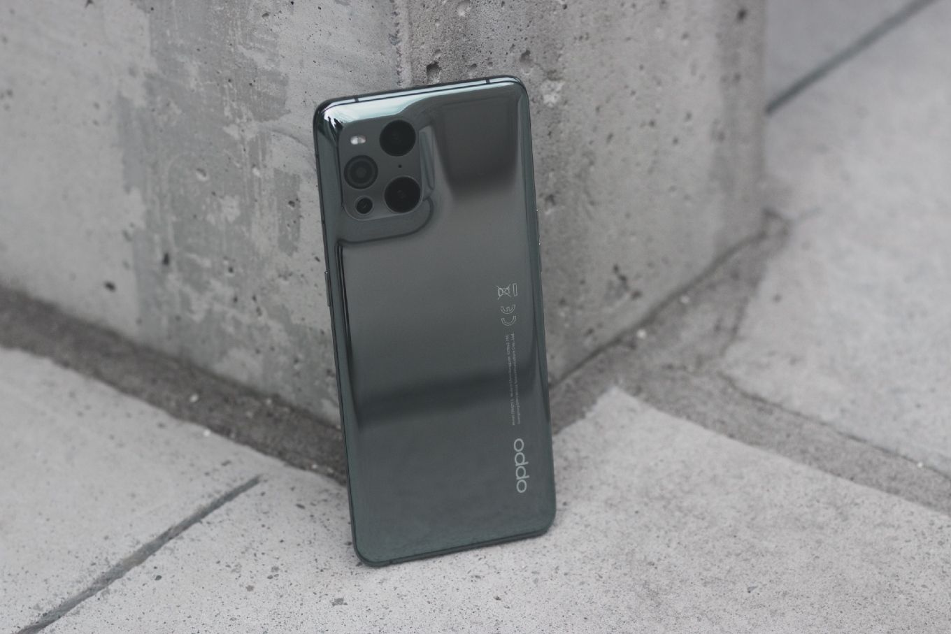 Oppo Find X3 Pro against wall