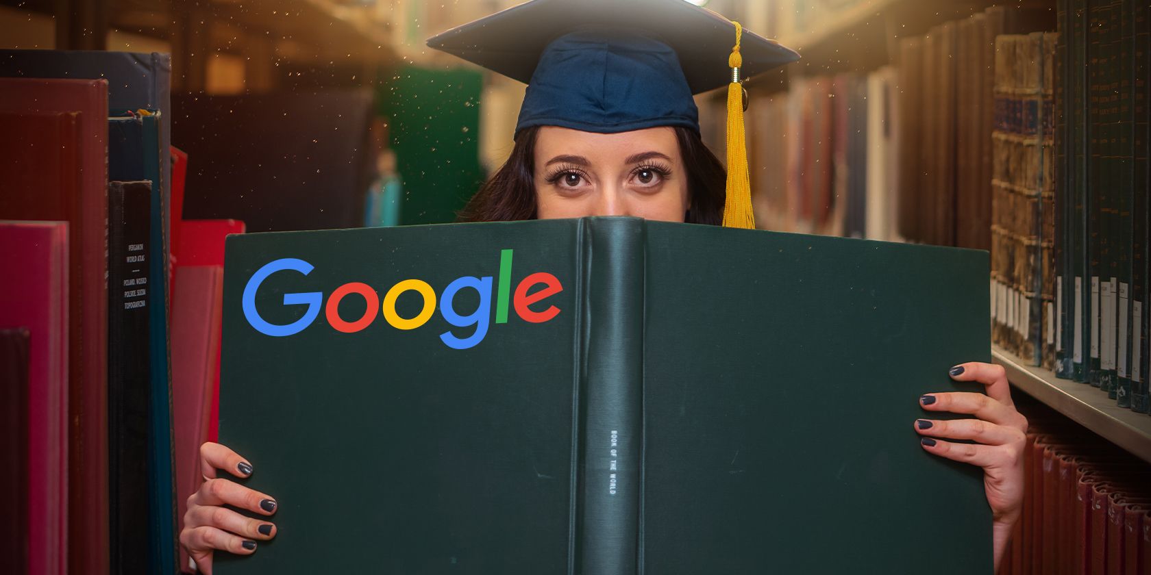 Graduate Scholar holding a book with the Google Logo