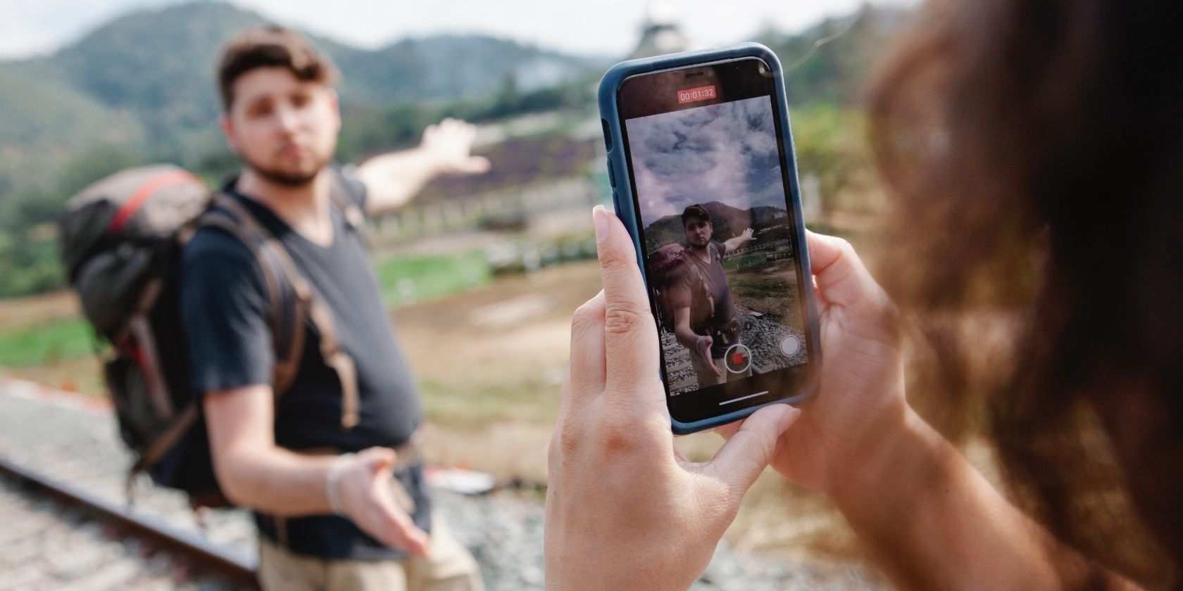 Person Taking a Video of Another Person Using iPhone