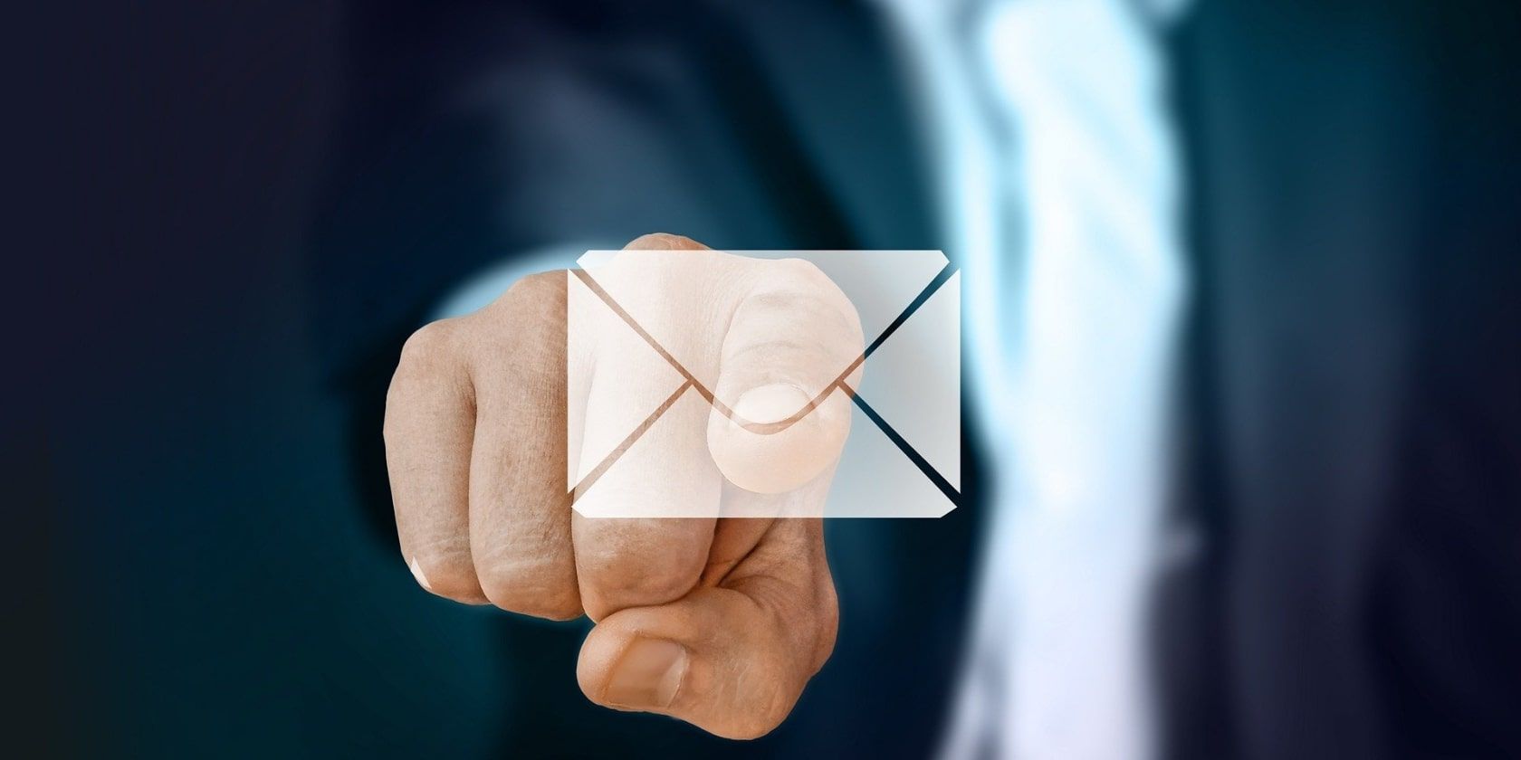 A person touching on an email logo