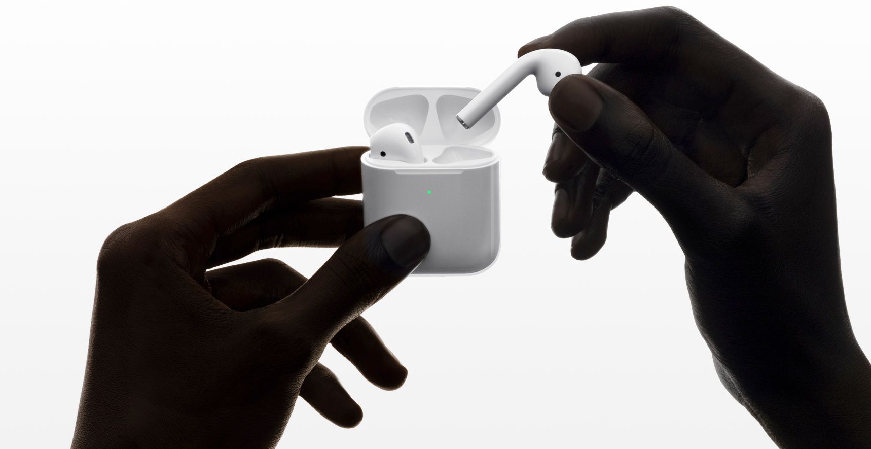 Apple promo image removing AirPods from the case