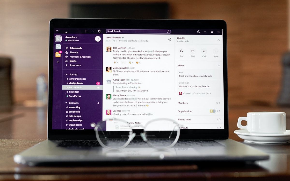 A laptop showing Slack's desktop app