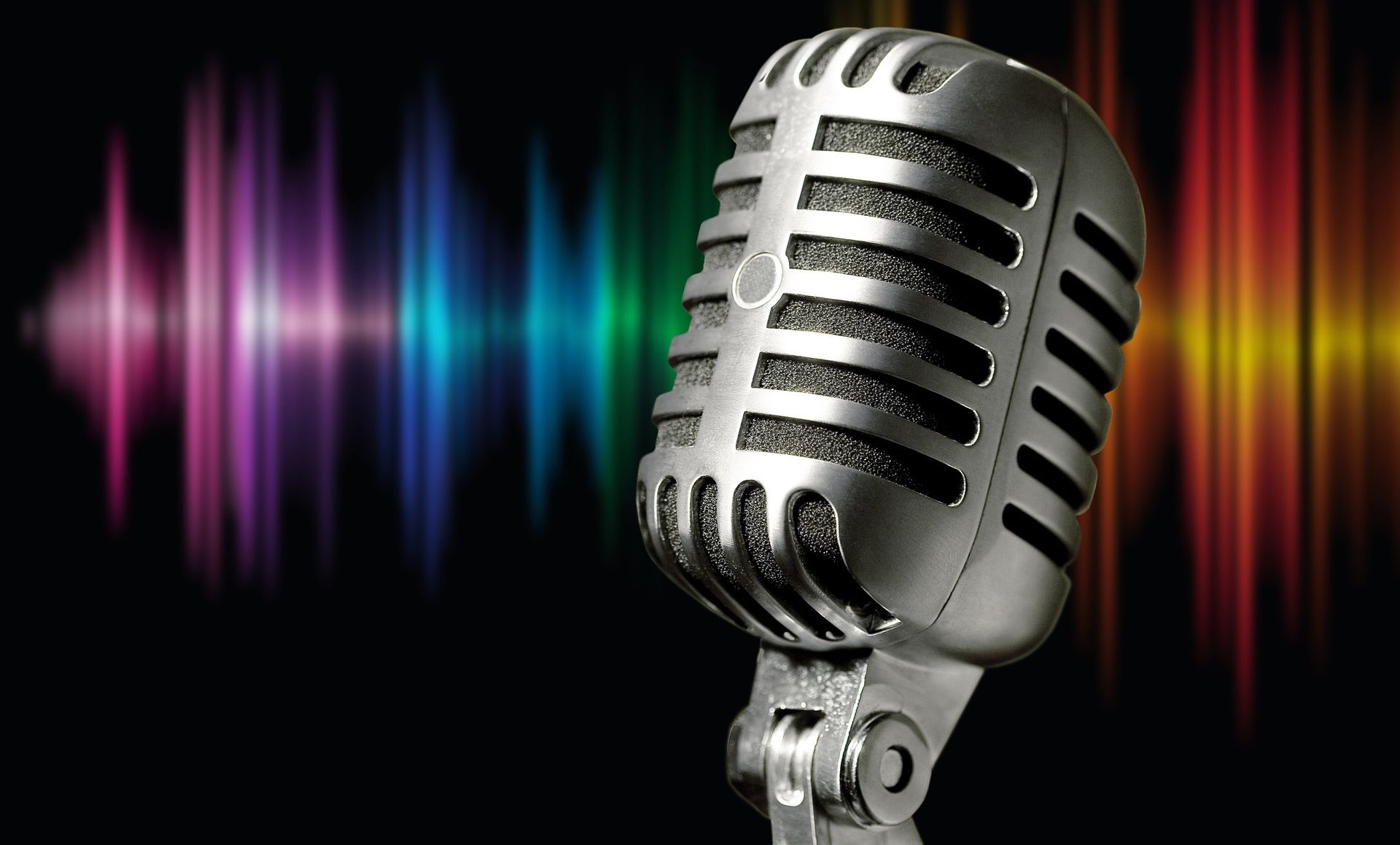 microphone in front of rainbow waveform