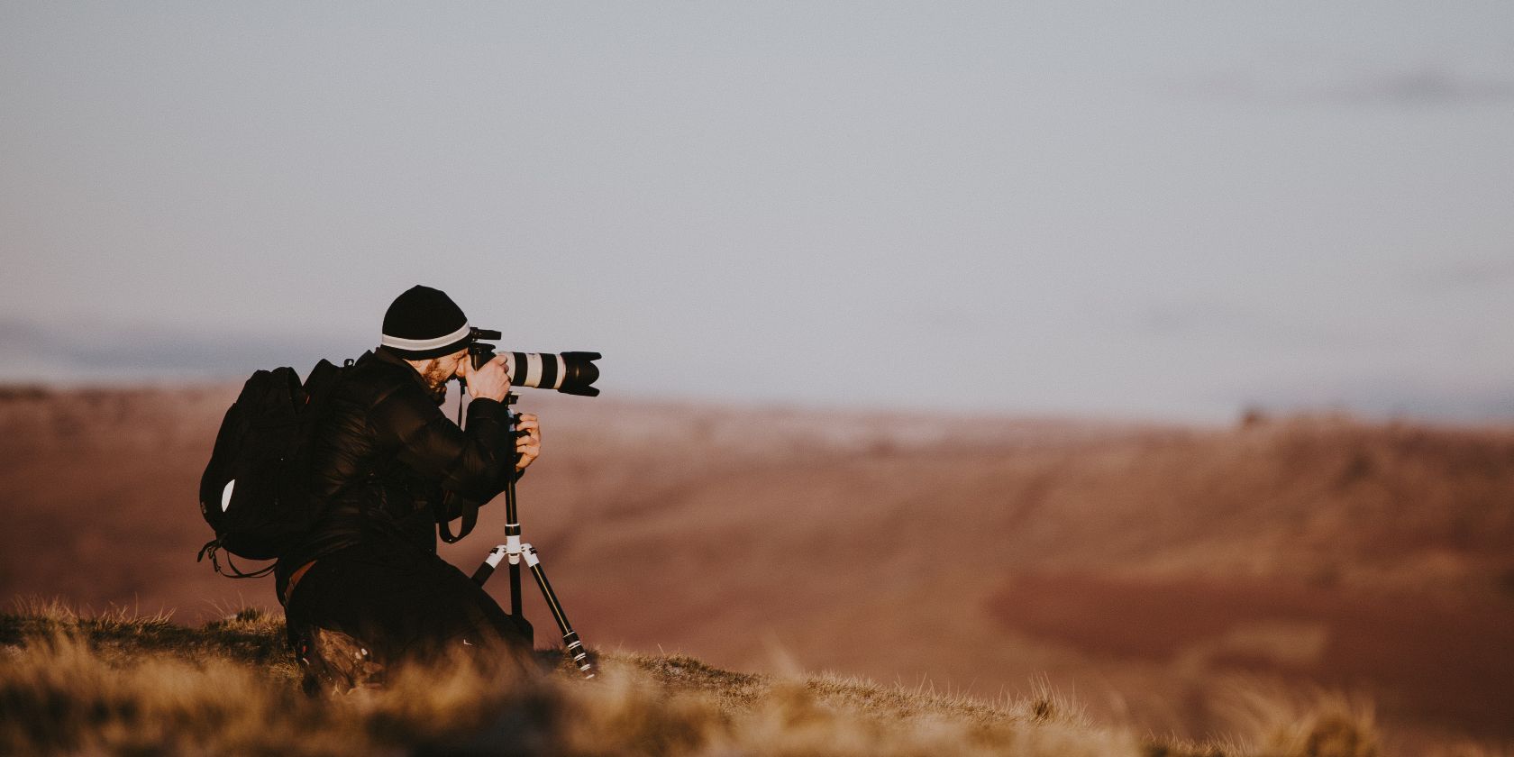 Photo of a photographer taking pictures in nature