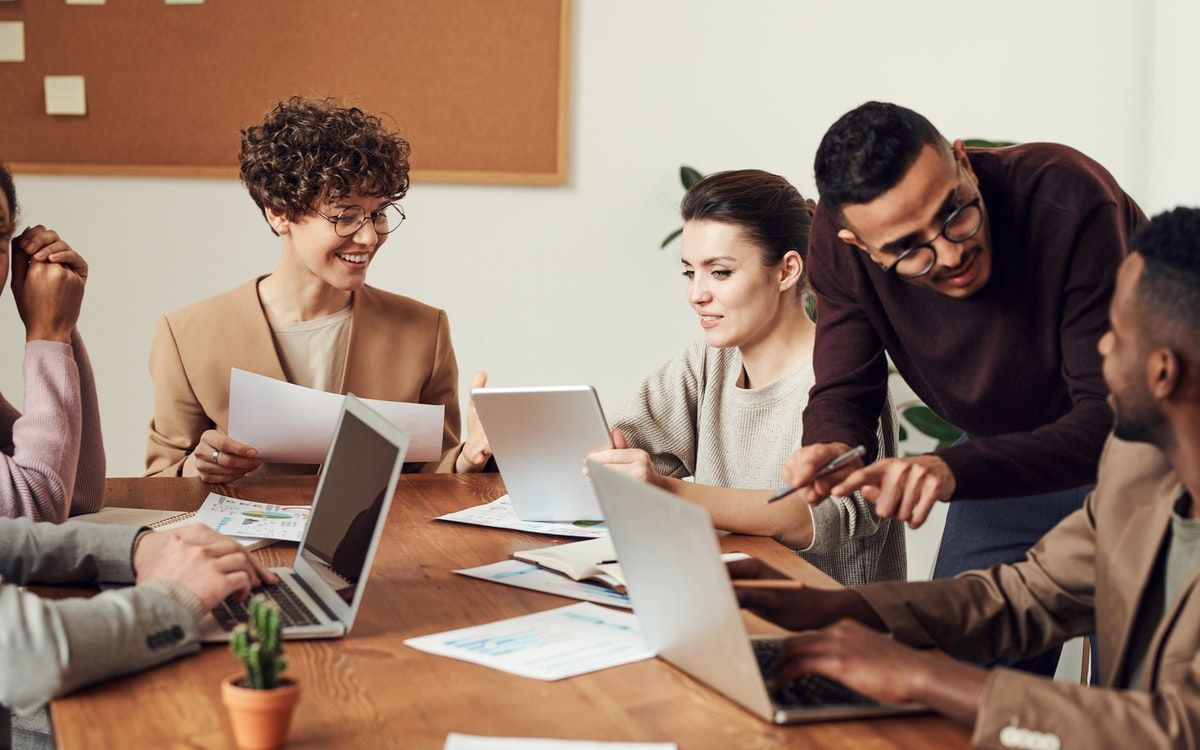 A group of people having a meeting