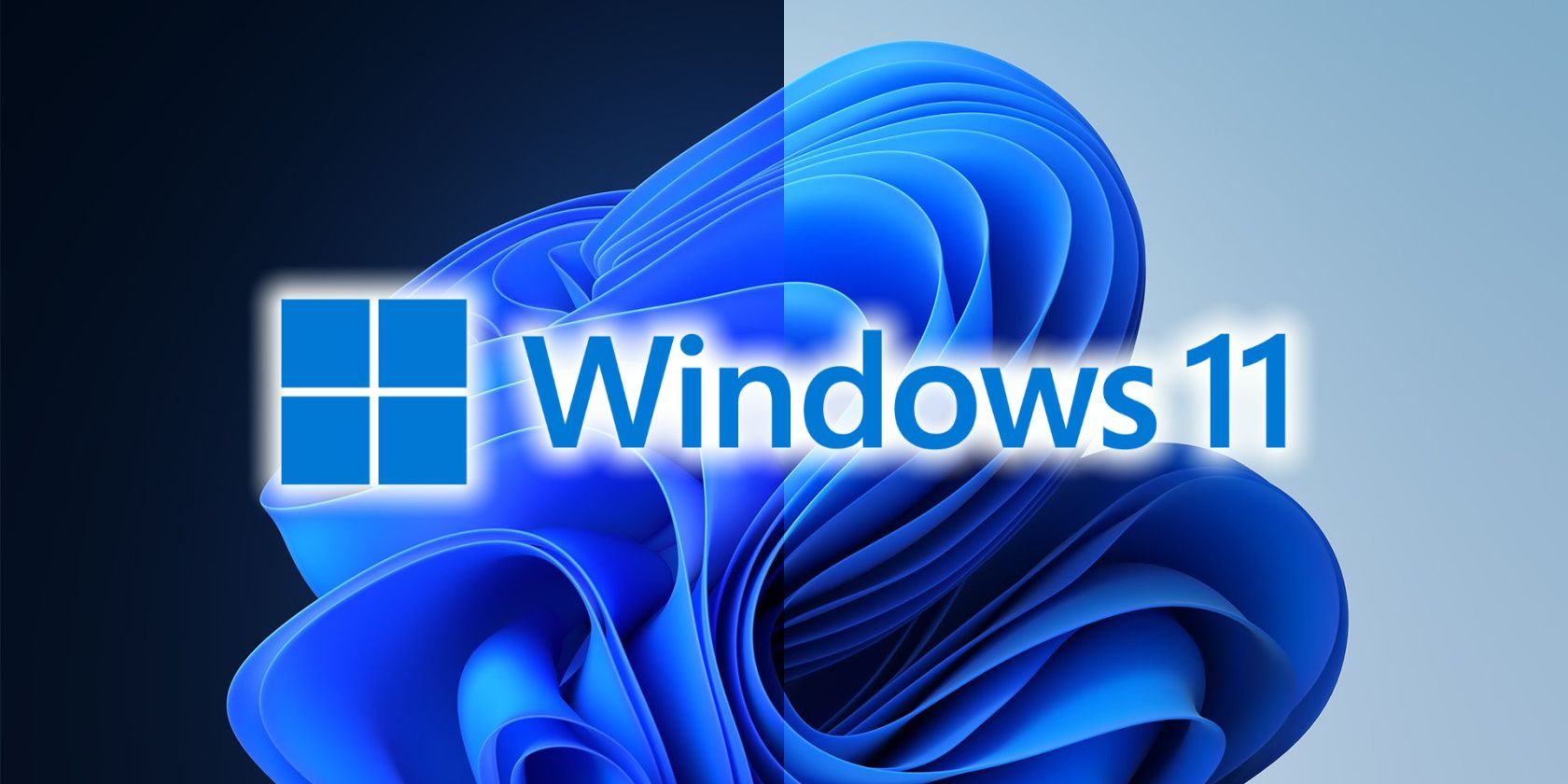 Windows 11 logo with split dark and light mode default wallpaper