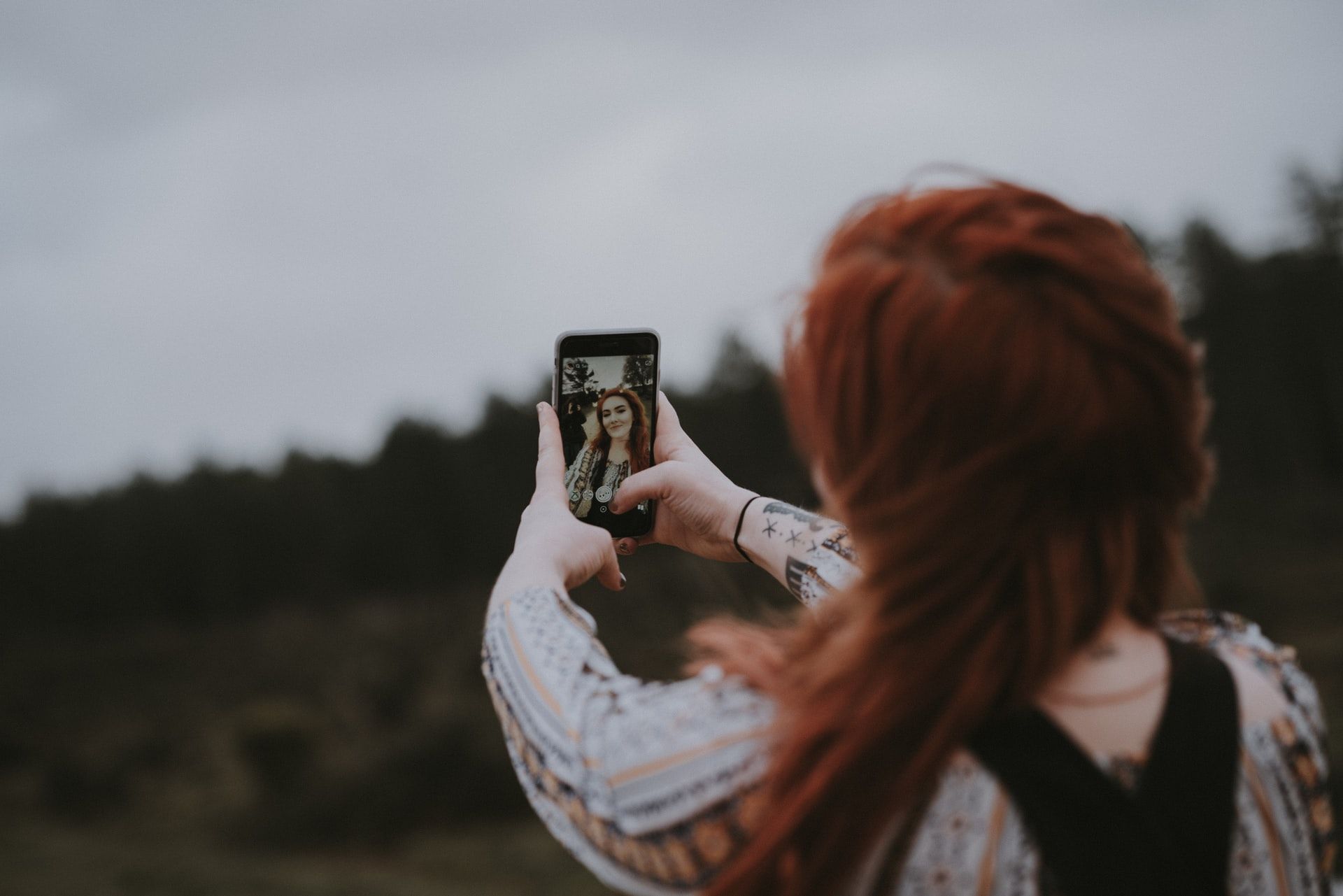 A woman taking a selfie