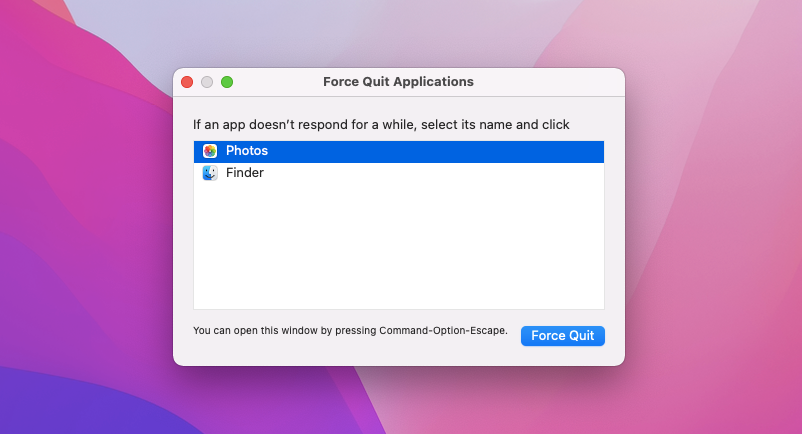 Force-quitting Photos app on Mac.