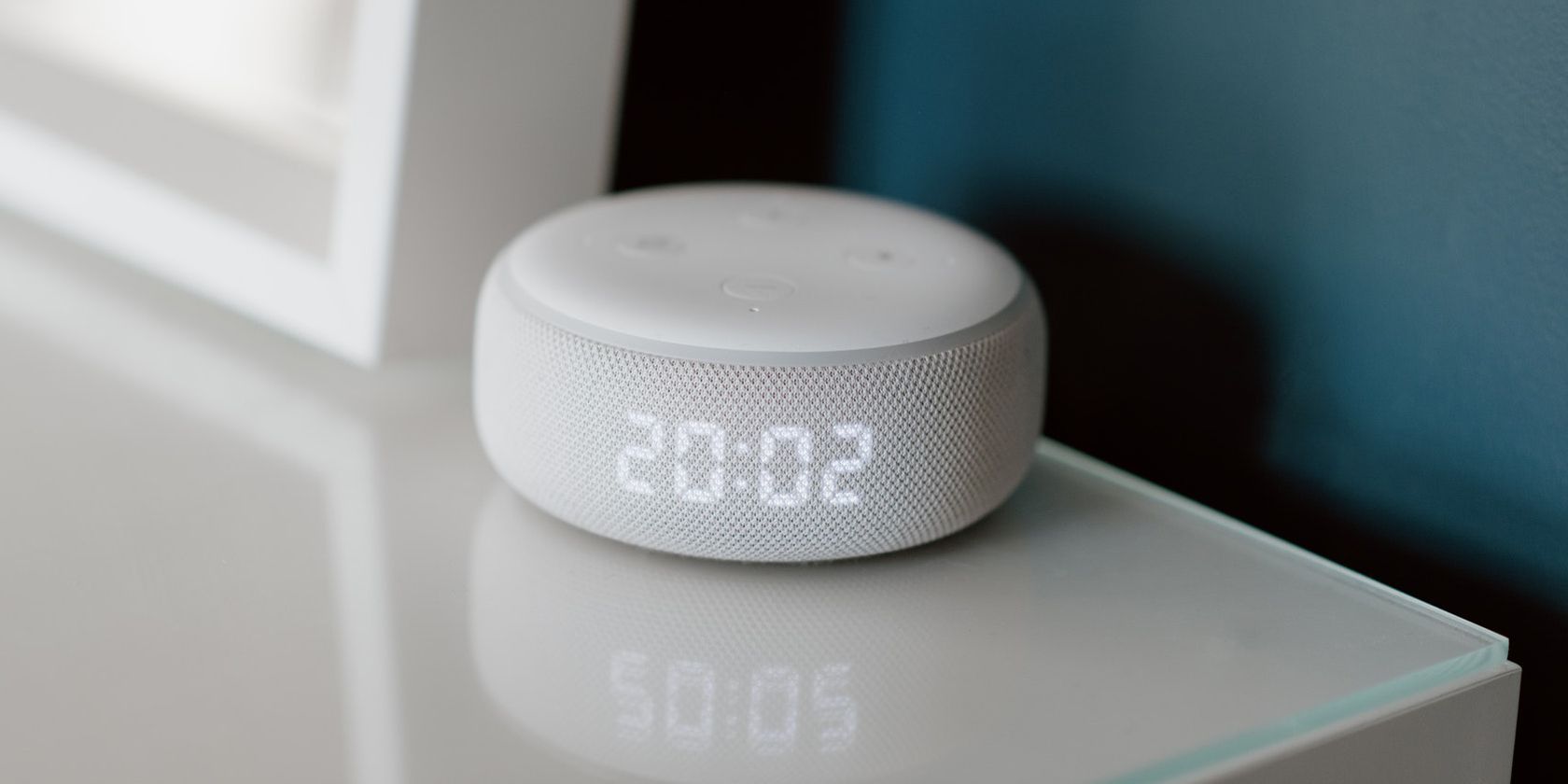 An image showing Amazon Echo Dot and its clock