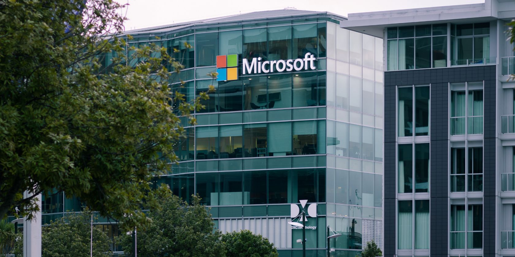 Microsoft Office logo on a glass building facade