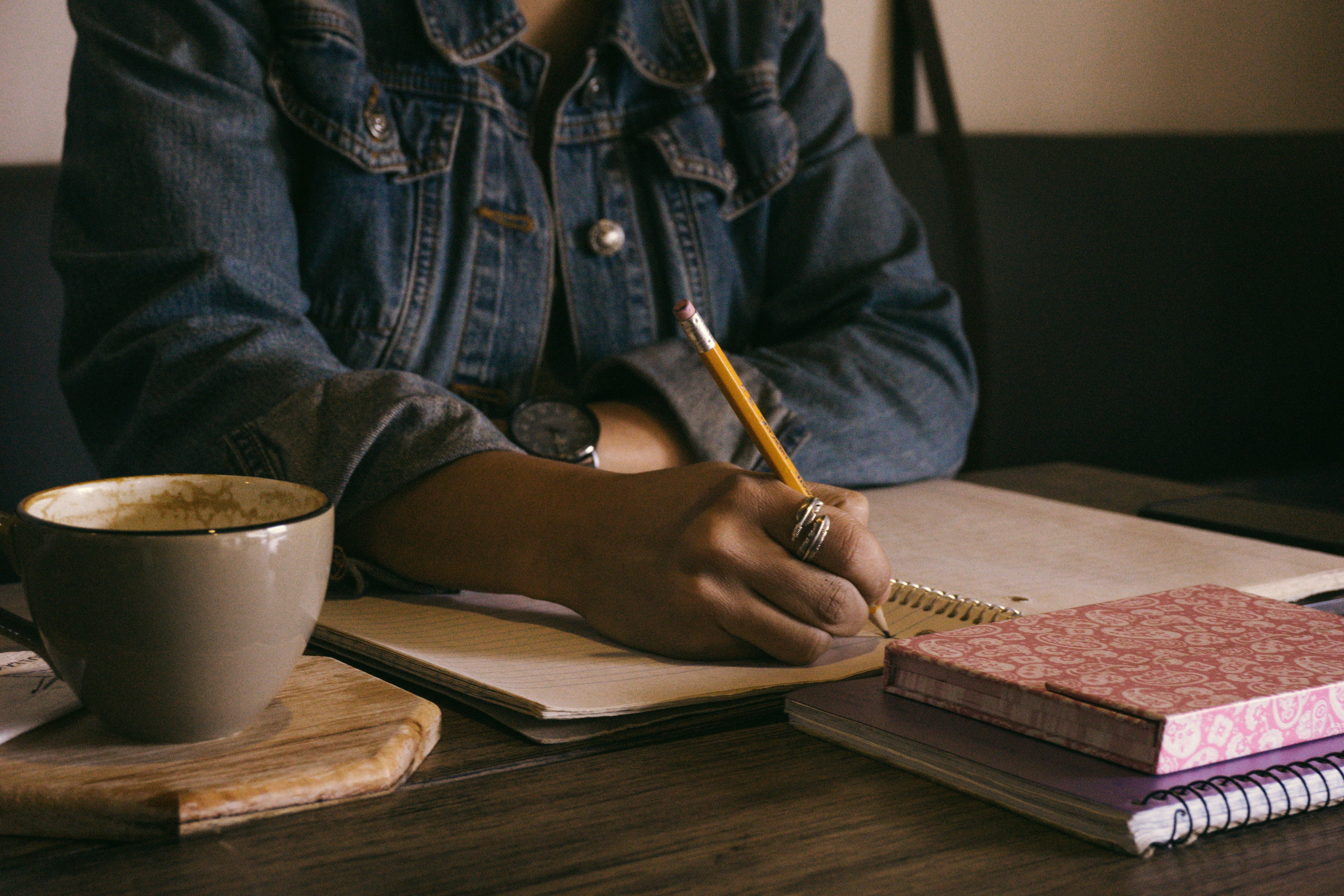 Person writing a letter