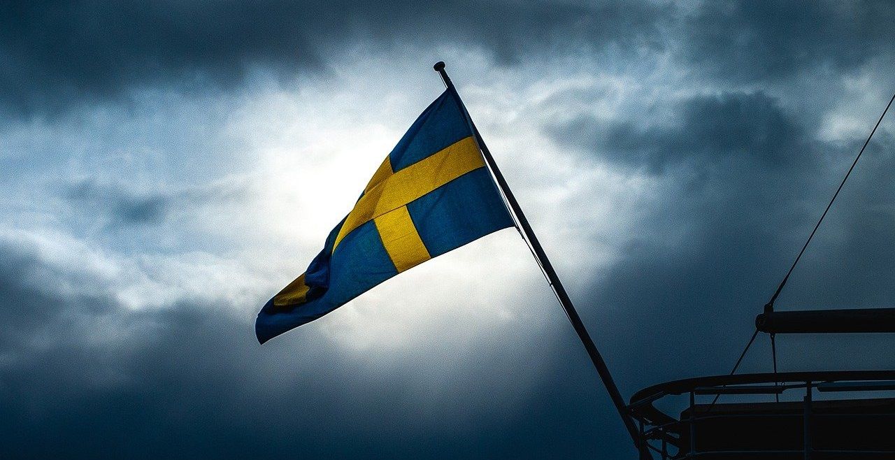 The Swedish national flag with cloud
