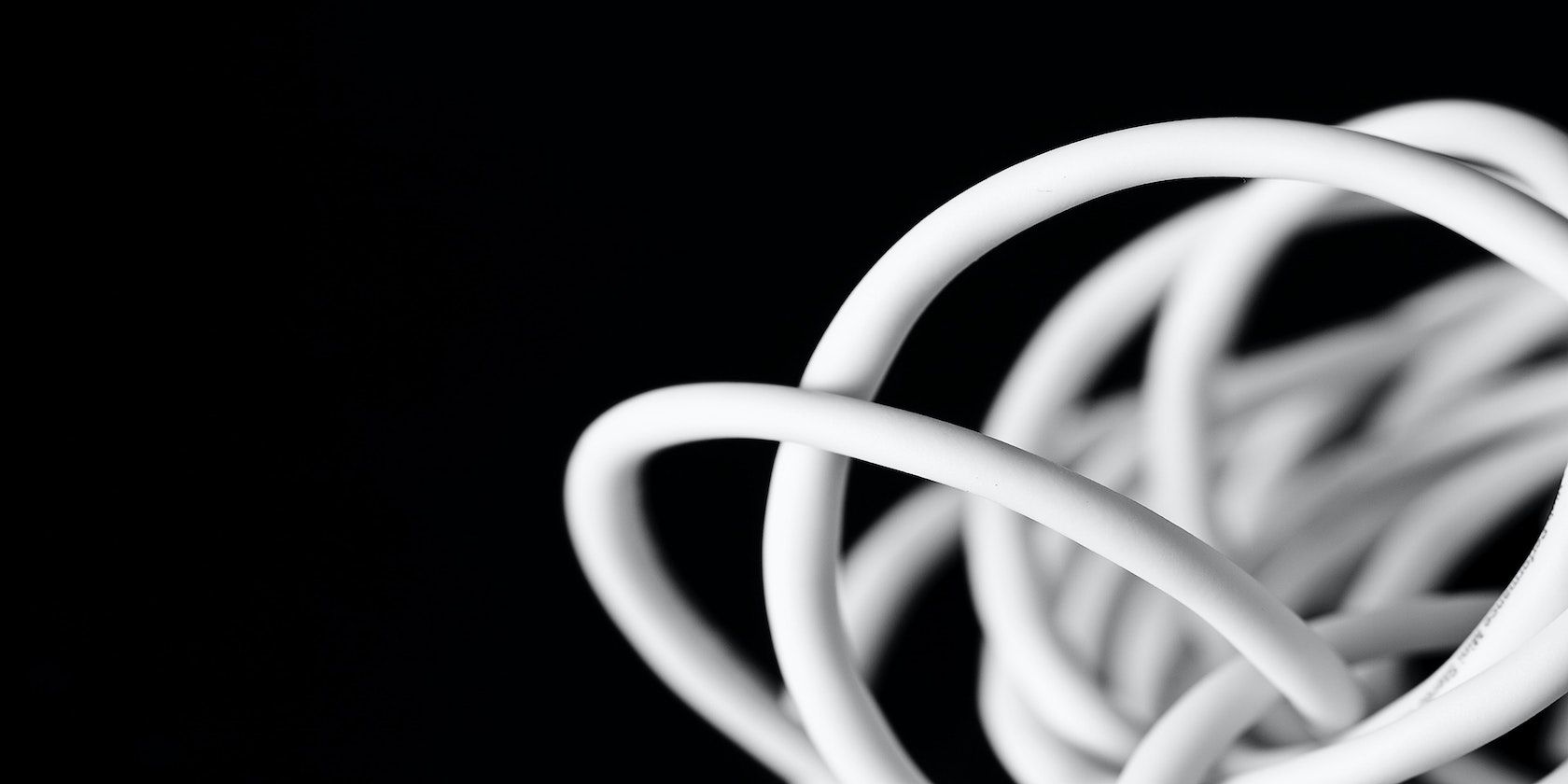 An abstract photo of a white coated cable